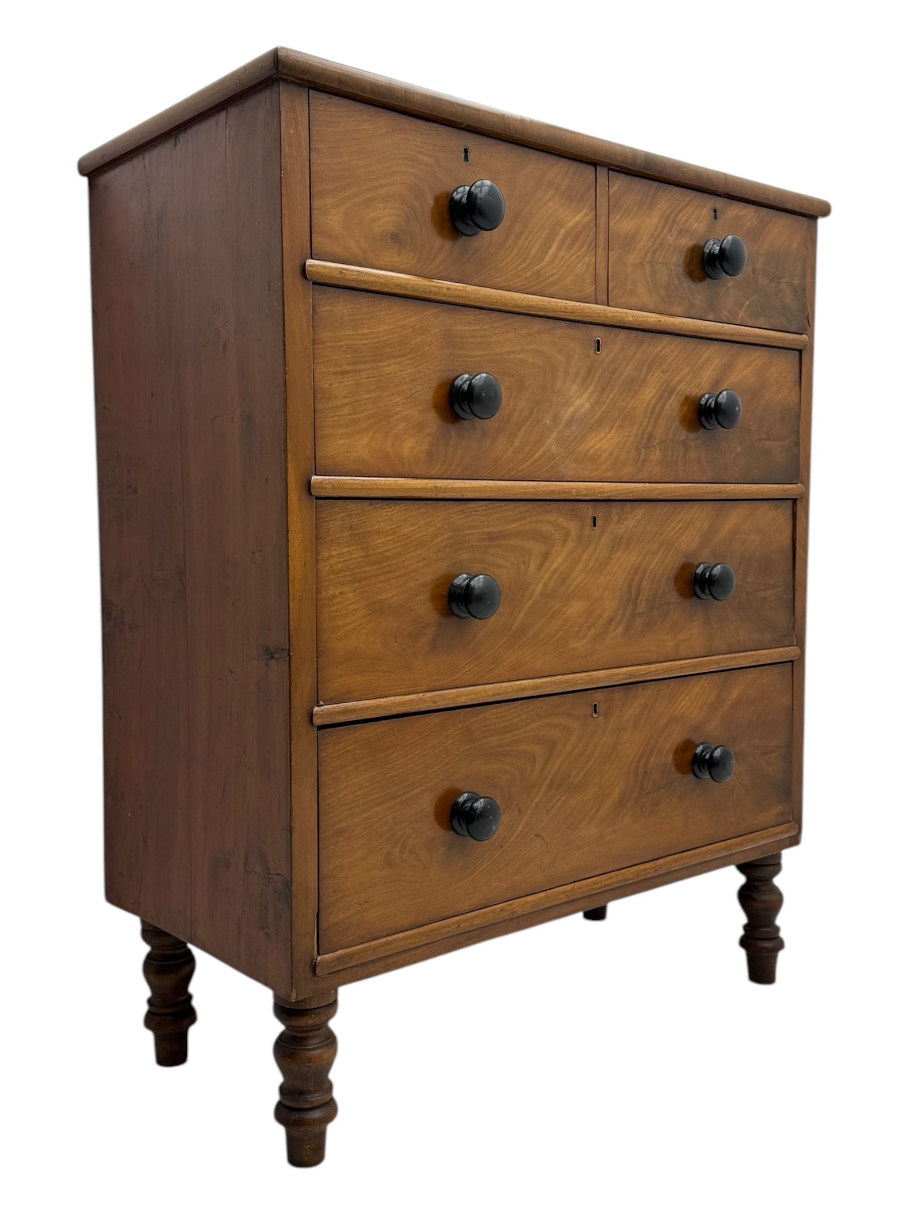 Late Victorian mahogany chest of drawers, with rectangular top over two short and three long graduated drawers, each fitted with ebonised turned knob handles and keyholes, raised on turned supports