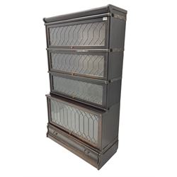 Globe Wernicke - early 20th century oak stacking library bookcase, enclosed by four lead glazed doors, fitted with single drawer