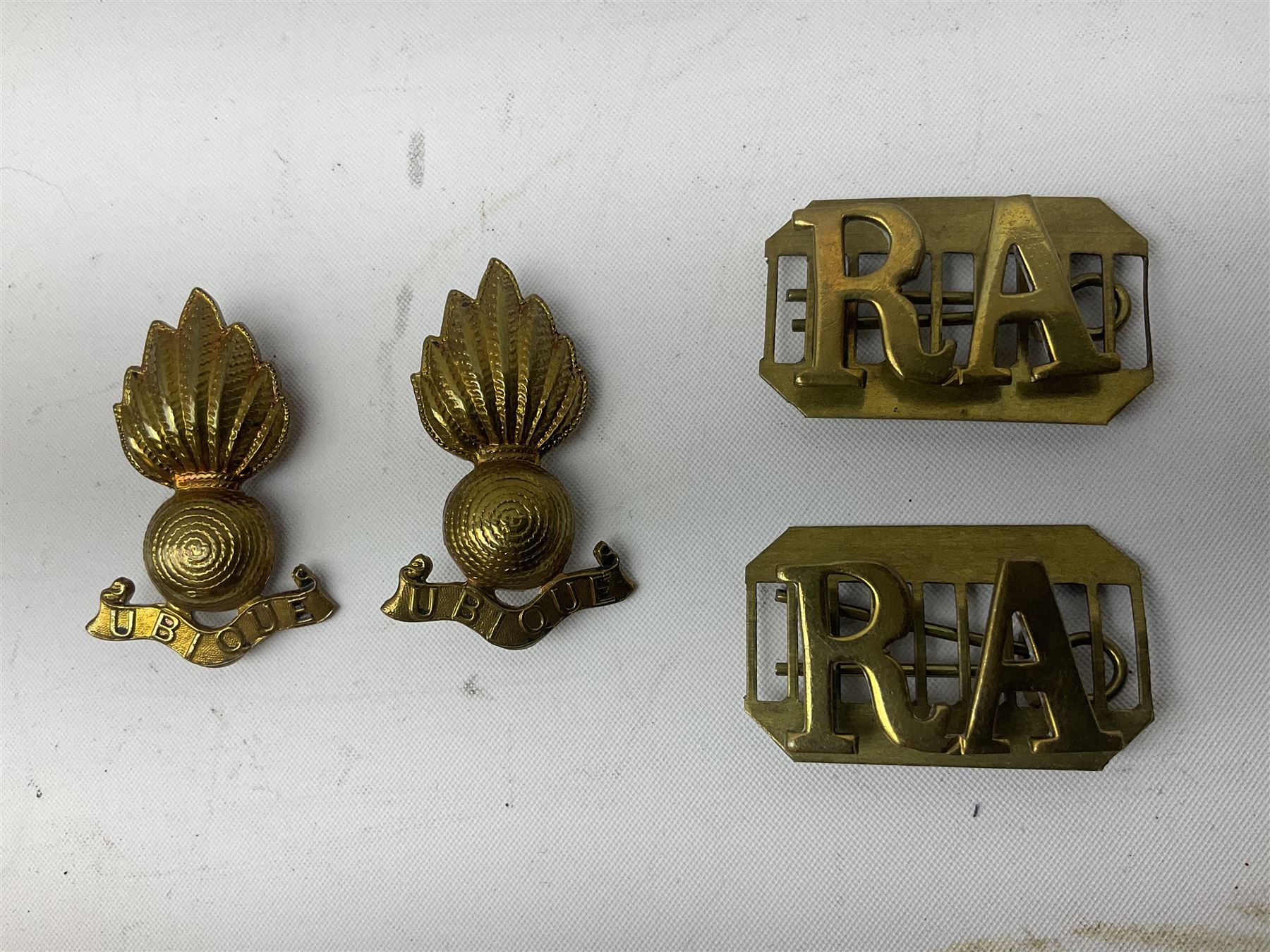 Royal Artillery 9ct gold and enamel sweetheart brooch in original box; together with Royal Artillery shoulder title, brass badges and buttons; and WW2 Defence Medal in issue box to 232775 addressed to Mrs. J.M. Morgan