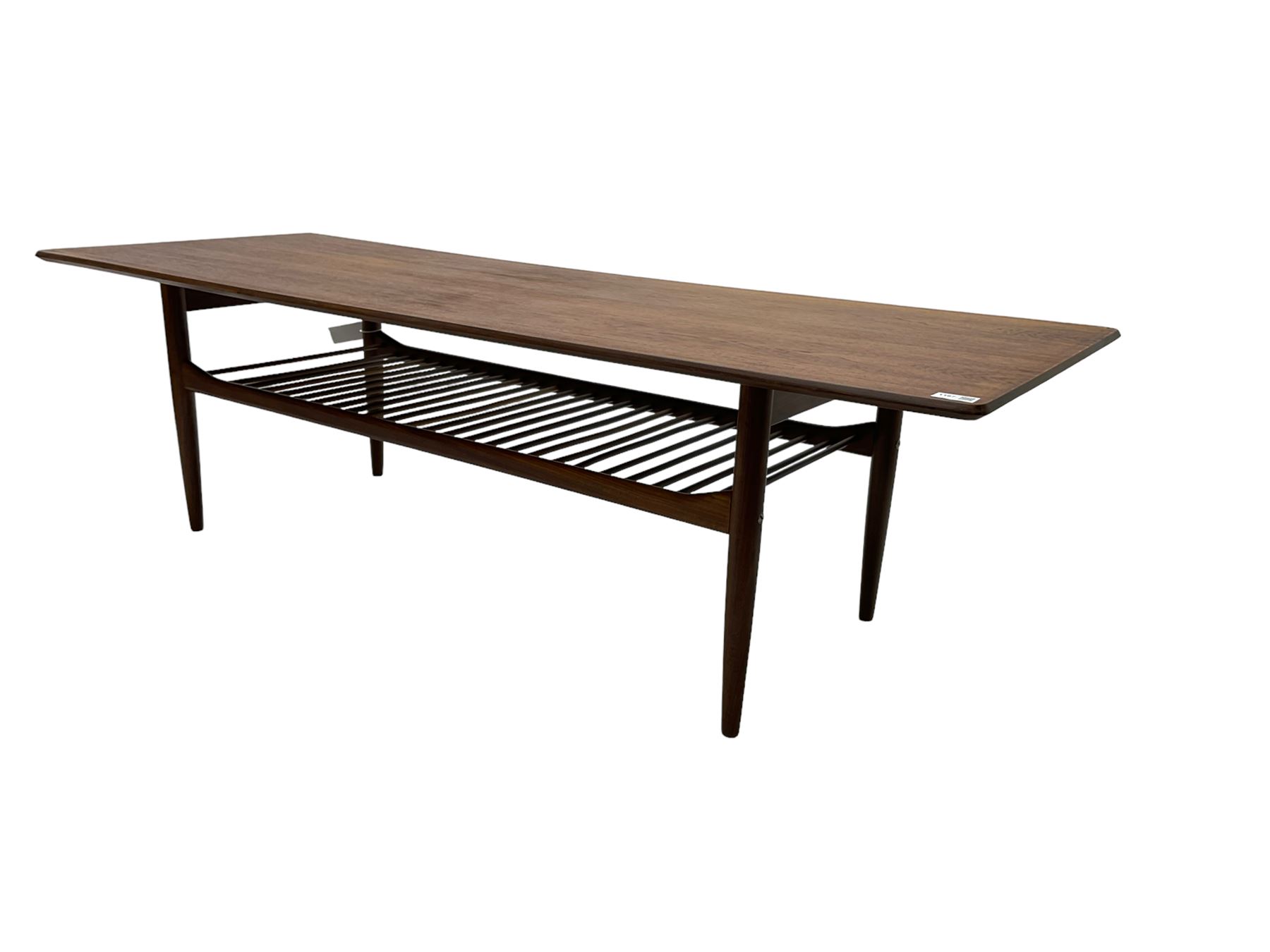 Kofod Larsen for G-Plan - mid-20th century  teak coffee table, rectangular top over spindle slatted undertier, raised on tapering supports 