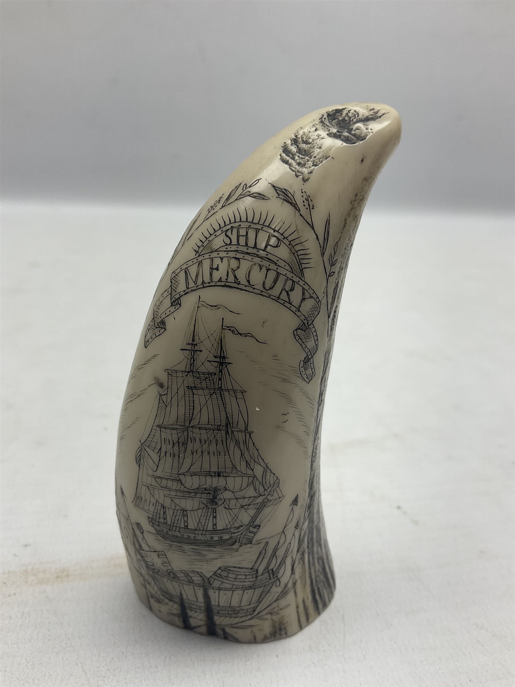 20th century resin carvings in the style of scrimshaws the first example depicting Ship Mercury, the other with a removable top, tallest example H10.5cm