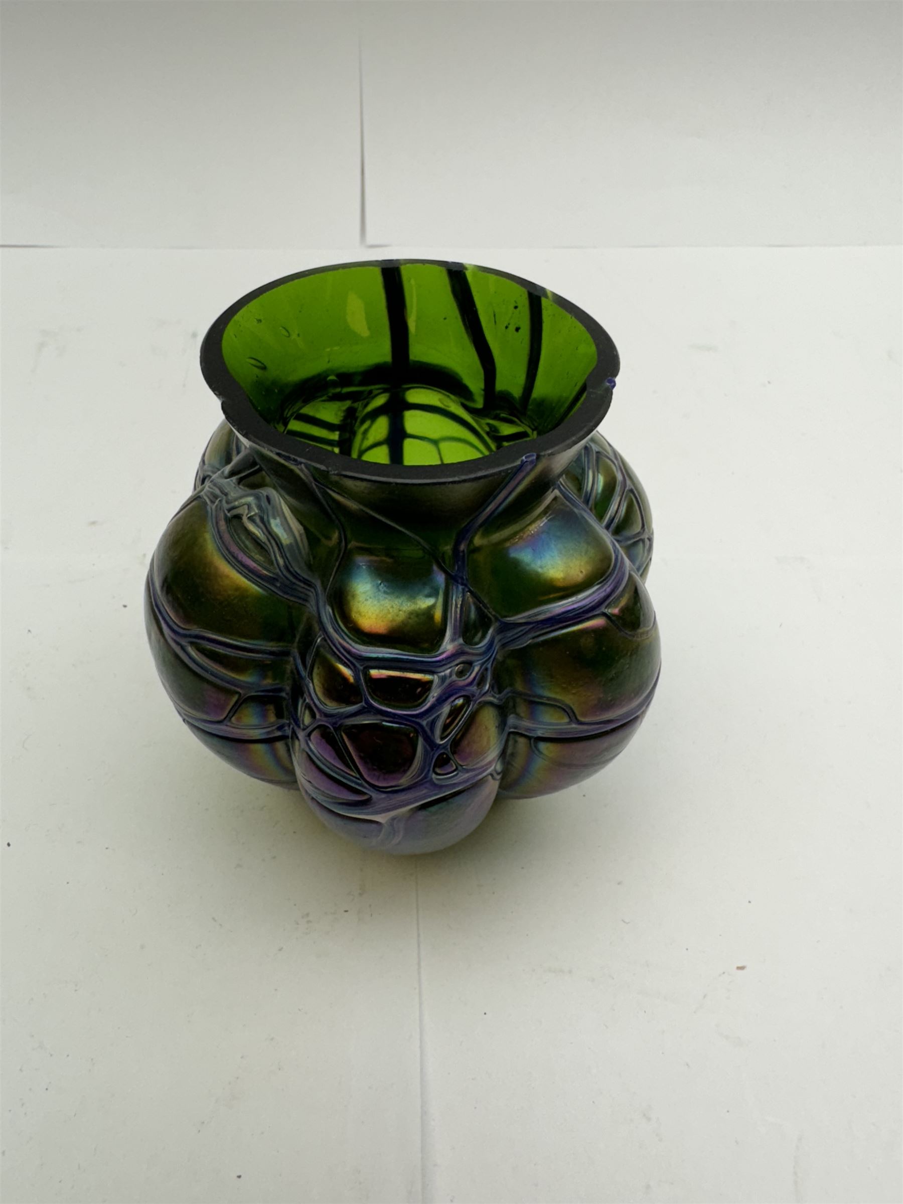 Three Austrian Art Nouveau Kralik iridescent glass vases, to include two of squat baluster form and a taller example, all green with threaded vein decoration to body, tallest H13.5cm