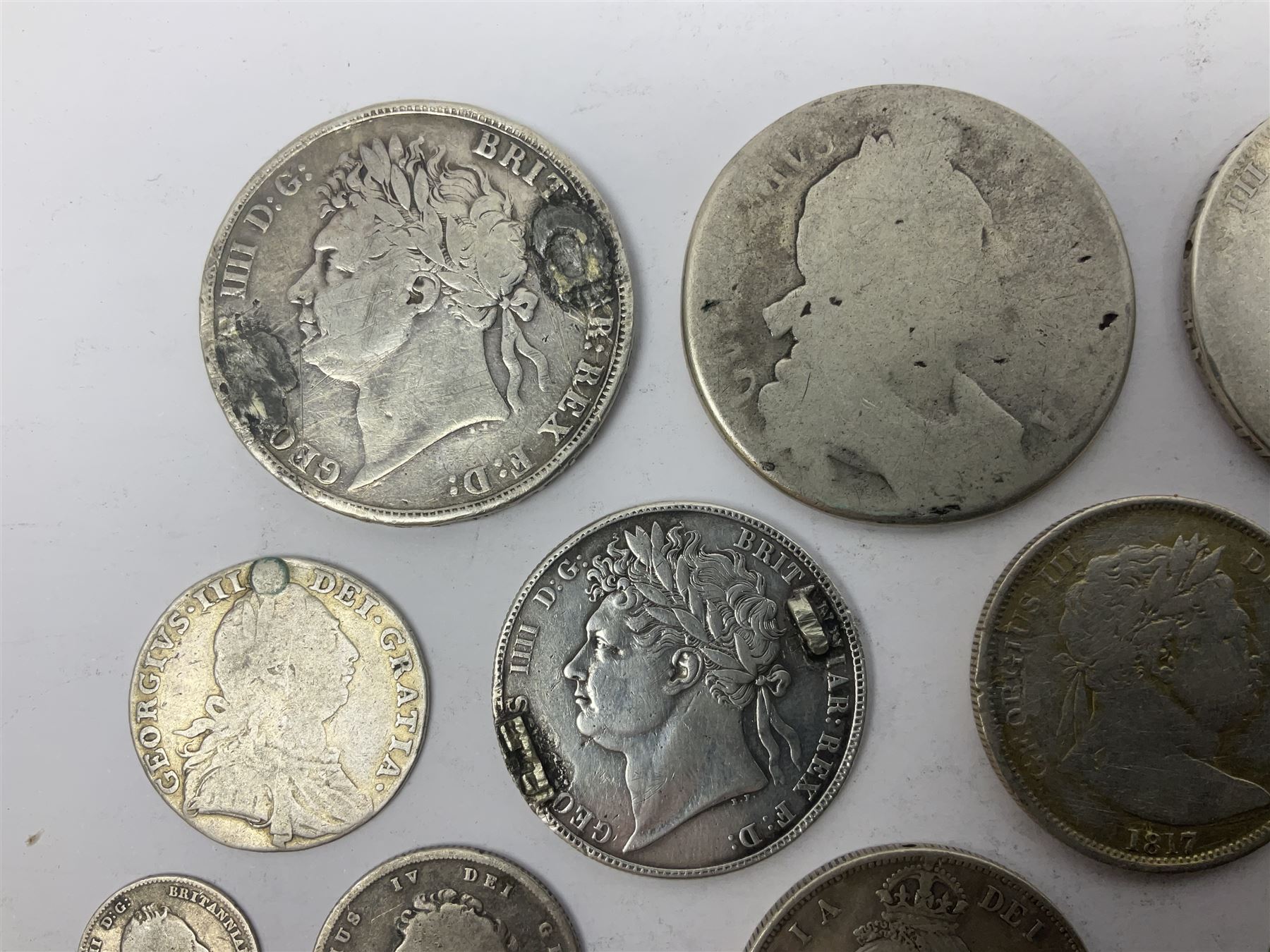 Approximately 200 grams of Great British pre 1920 silver coins, mostly previously mounted or holed, including crowns, half crowns etc
