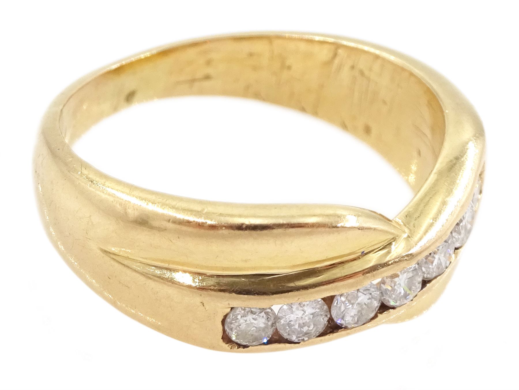 Gold channel set, round brilliant cut diamond crossover ring, total diamond weight approx 0.30 carat
