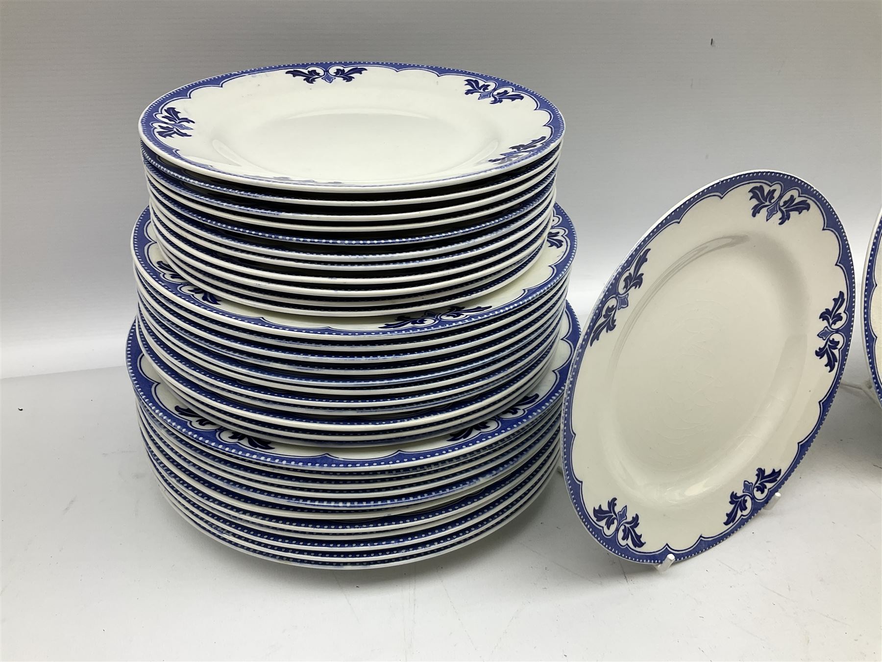 Burgess and Leigh Middleport pottery dinner wares decorated in the ‘Milford’ pattern, to include lidded tureens, graduated meat plates, dinner plates etc 