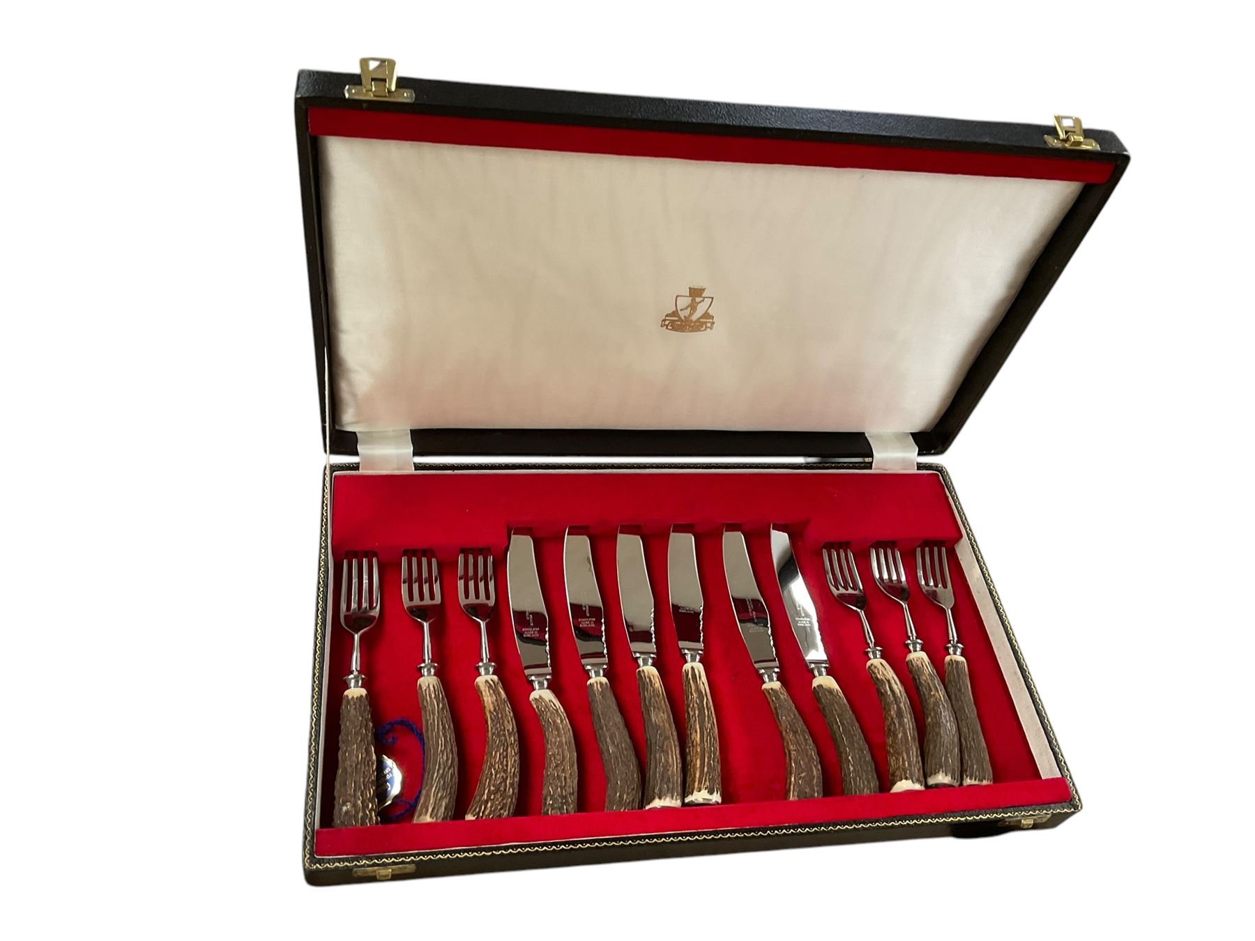 Horn handled canteen of cutlery set, together with with wooden cigarette box, two Nao figures and Lladro figure 