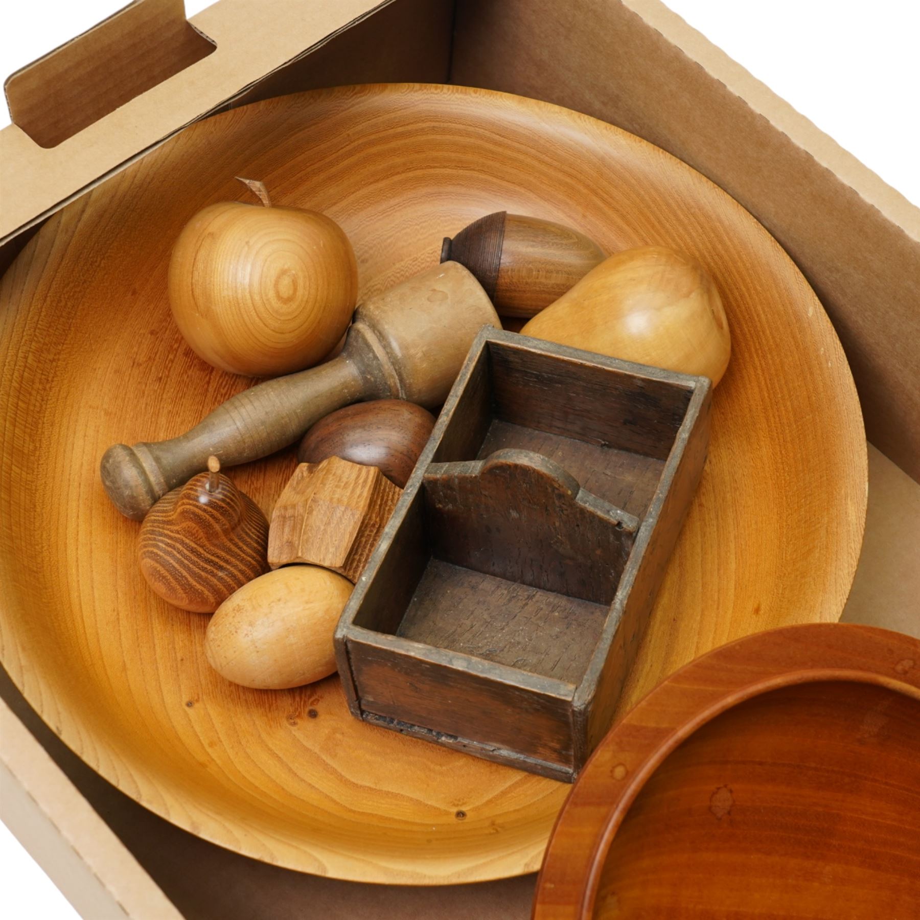 Doorstop in the form of a bell, Rabbitman napkin ring, turned wooden bowls including satinwood, and a primitive two section oak tray
