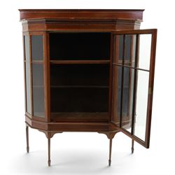 Edwardian inlaid mahogany display cabinet of rectangular canted form, galleried top with crossbanded inlay, above a glazed cabinet enclosing  baize lined shelves, raised on square tapering legs terminating in spade feet  