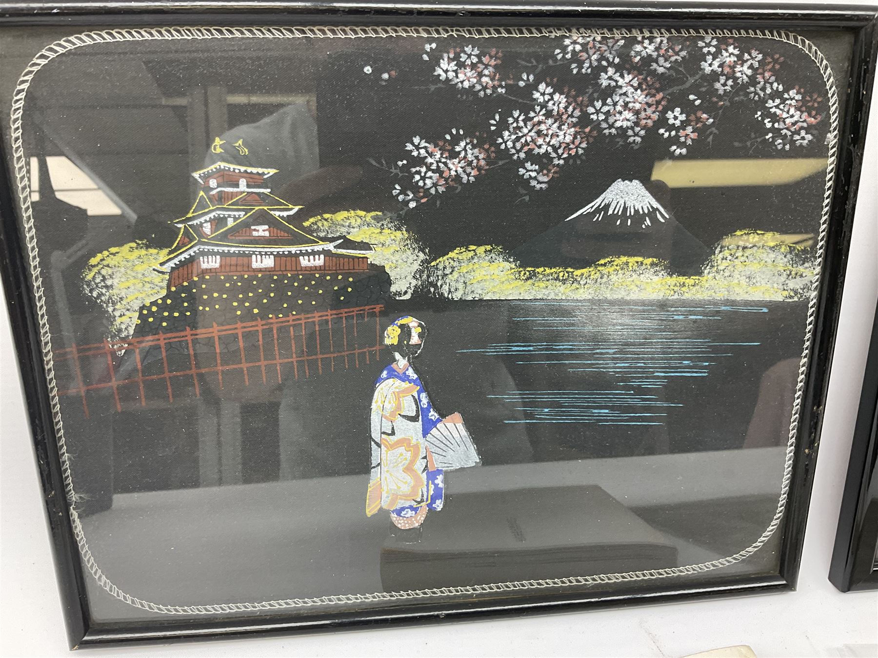 'A History of Kure'. Volume eight with Japanese text and photographic illustrations including Hiroshima; associated paperwork and provenance; and two ebonised framed Japanese painted and embroidered panels depicting Mount Fuji and bearing label verso 'Bought in Kure Hiroshima while serving Royal Navy 1946 S. Mason' 23 x 30cm