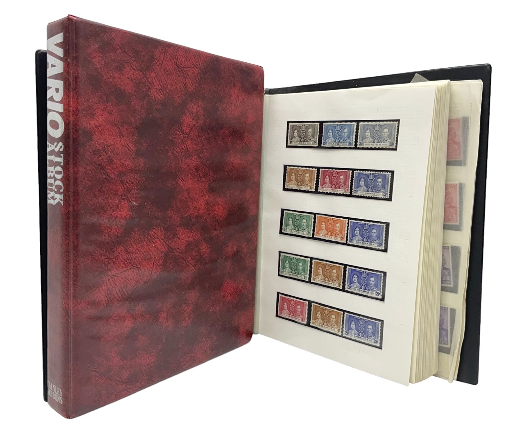 Stamps including various King George VI 12th May 1937 coronation, various 8th June 1946 Victory, various 1923-1948 Silver Wedding, Turks and Caicos Islands 'Raking Salt' mint marginal blocks of four etc, housed in two ring binder folders