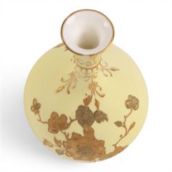 Pair of Royal Crown Derby bud vases, decorated with gilt floral sprigs upon a yellow ground, marked beneath, H14cm