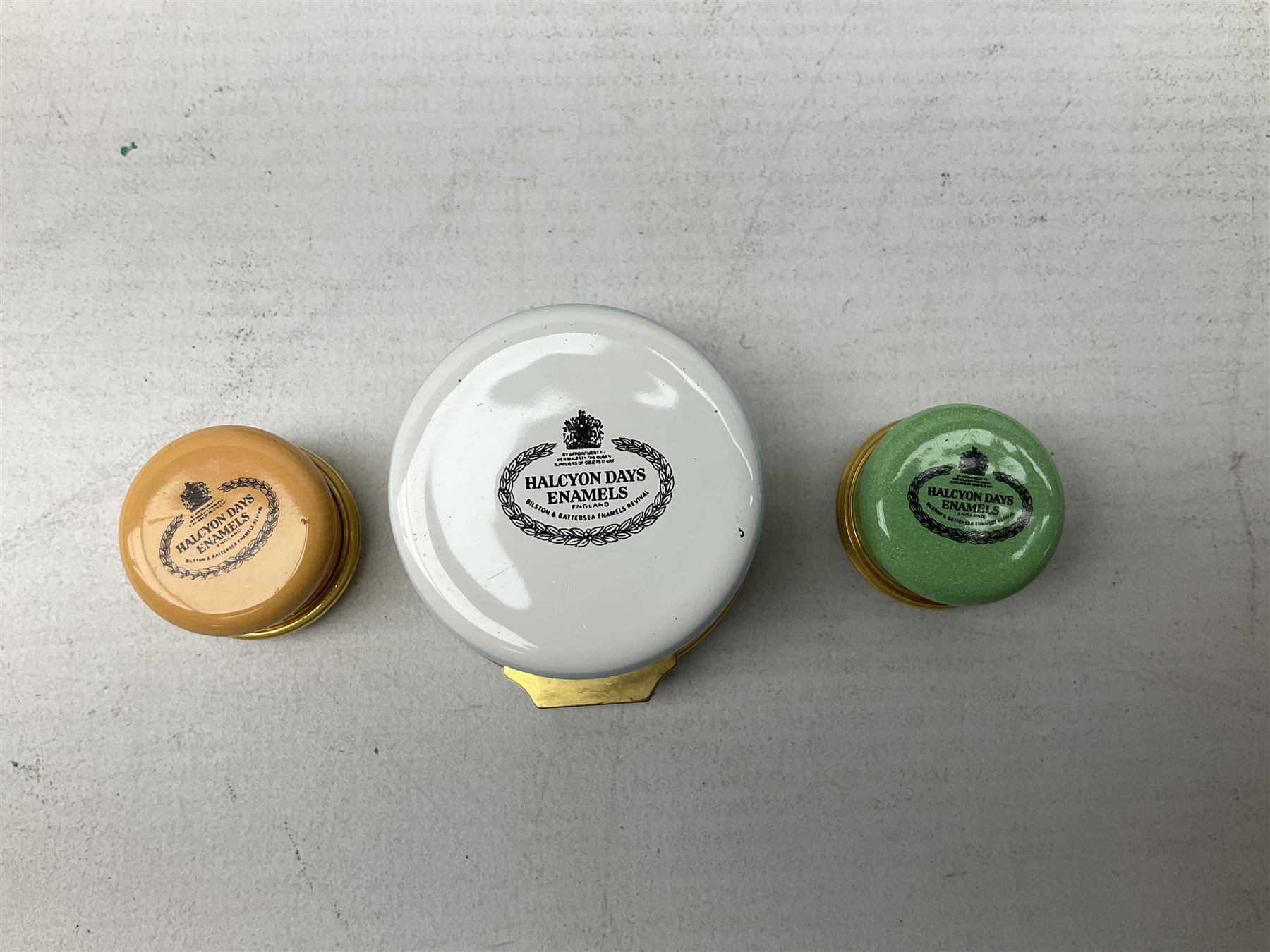Group of seven Halcyon Days enamel boxes, each with affectionate inscriptions, including 'Wild about you', 'Don't ever change', 'Love you a bunch', etc., in six fitted boxes  