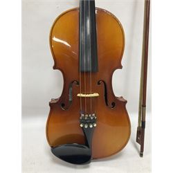 Full size violin with a maple back and ribs, spruce top and ebonised fingerboard, with bow and hard case Length 60cm