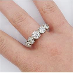 18ct white gold graduating five stone round brilliant cut diamond ring, total diamond weight 2.79 carat, with World Gemological Institute report