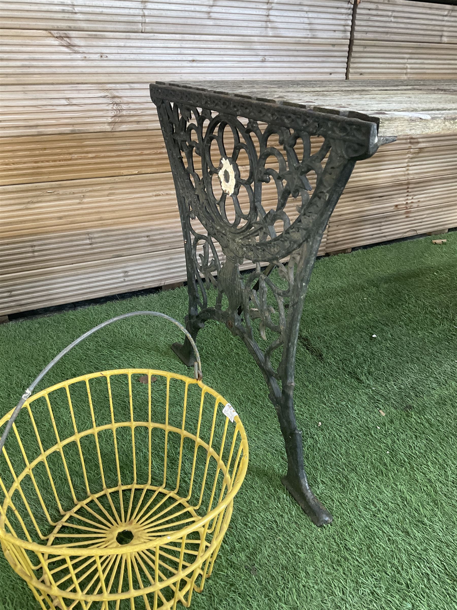 Cast iron and wood slatted garden table and pair of metal hanging baskets  - THIS LOT IS TO BE COLLECTED BY APPOINTMENT FROM DUGGLEBY STORAGE, GREAT HILL, EASTFIELD, SCARBOROUGH, YO11 3TX