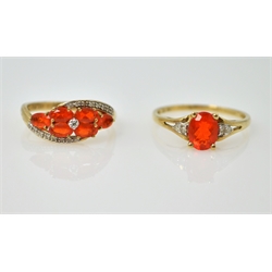 Two Mexican fire opal and diamond gold rings hallmarked 9ct