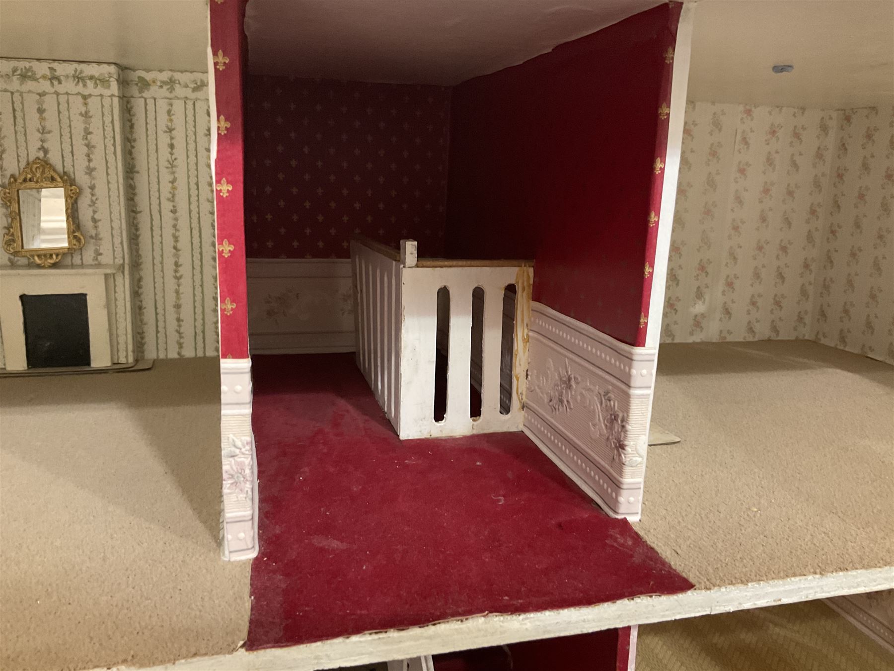 Modern scratch-built Palladian style wooden dolls  house as a 19th century double fronted two-storey property with simulated brick and stone walls under a removable simulated slate hipped roof; the triple hinged front elevation opening to reveal six rooms with central hall, stairs and landing L94cm H56cm D40cm