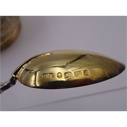 Victorian silver bowl, with embossed floral decoration and beaded rim, gilt interior and two applied shield cartouches, upon stepped circular foot, with a silver apostle spoon, with gilt bowl, both hallmarked George Unite, Birmingham 1883, bowl H5.5cm, within fitted tooled leather, silk lined case