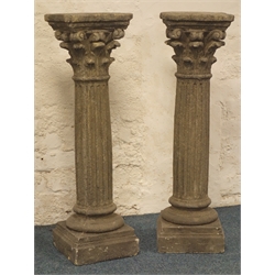  Pair stone effect Corinthian style pedestal stands, acanthus leaf capitals on fluted columns, stepped bases, H91cm  
