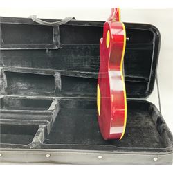 1980s Les Paul Epiphone limited edition cut-away electric guitar by Gibson, the burgundy coloured body with two pick-ups, volume and tone knobs and scratch plate, original tuning pegs, serial no.U6030215, 101cm overall; in modern Kinsman fitted carrying case