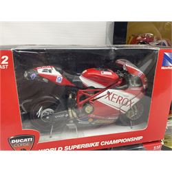 Nine NewRay 1:12 scale die-cast models of motorcycles including Ducati, Honda etc; and four other 1:12 scale die-cast models of motorcycles; all boxed (13)