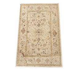 Persian design beige ground rug, patterned field