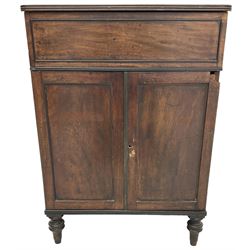 George III mahogany gentleman's dressing cabinet or washstand, reed moulded hinged top enclosing fitted interior, double cupboard below enclosed by two panelled doors, on turned feet 