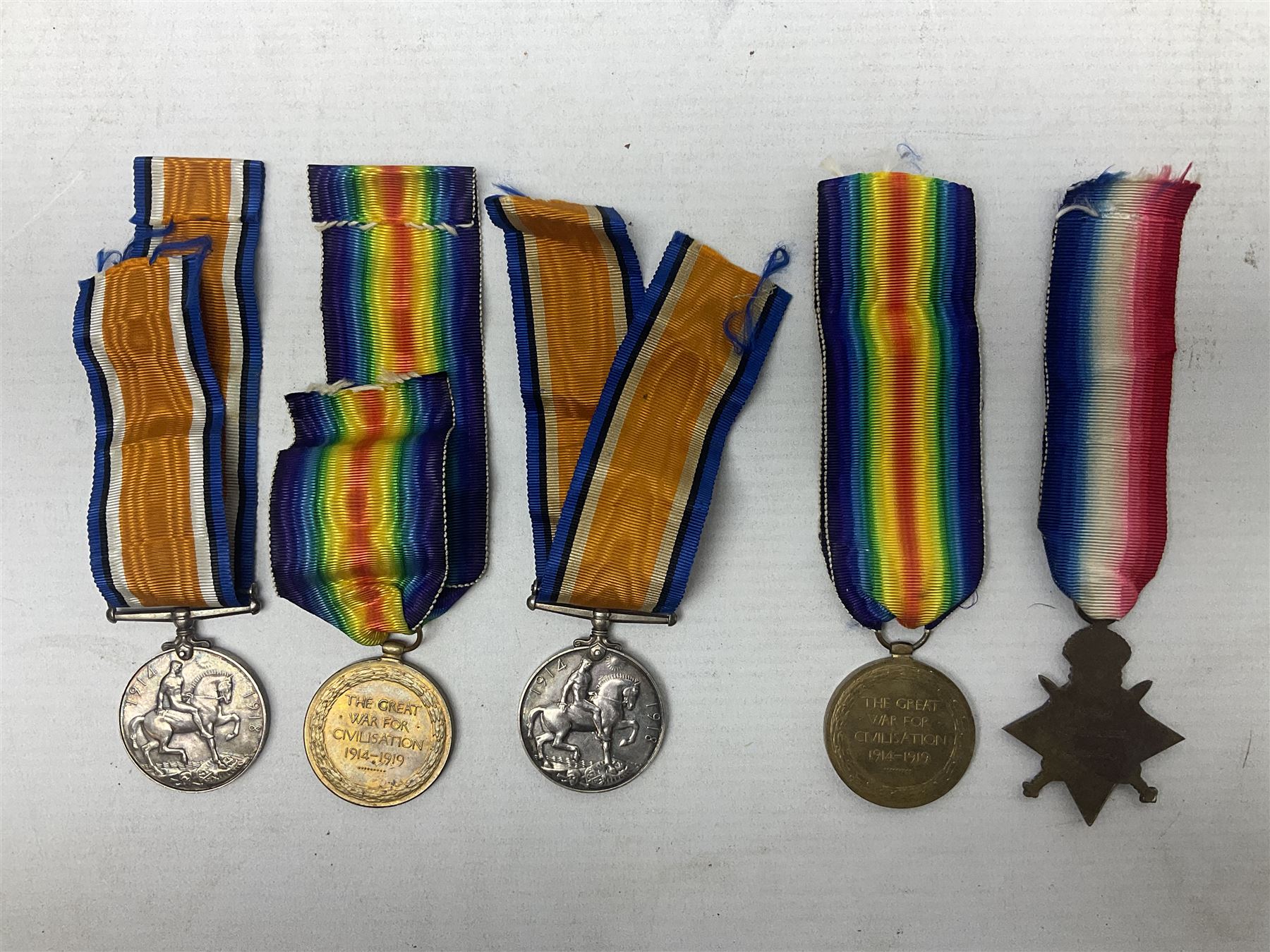 Family group of five WW1 medals for the East Yorkshire regiment comprising trio of 1914-15 Star, British War Medal and Victory medal awarded to 13-368 Pte. C. Padget; and British War Medal and Victory Medal to 201829 Pte. H.W. Padget; all with ribbons (5)