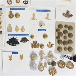 Collection of military cap badges, buttons and similar, including examples for Royal Army Medical Corps, Royal Army Pay Corps, Royal Engineers etc 