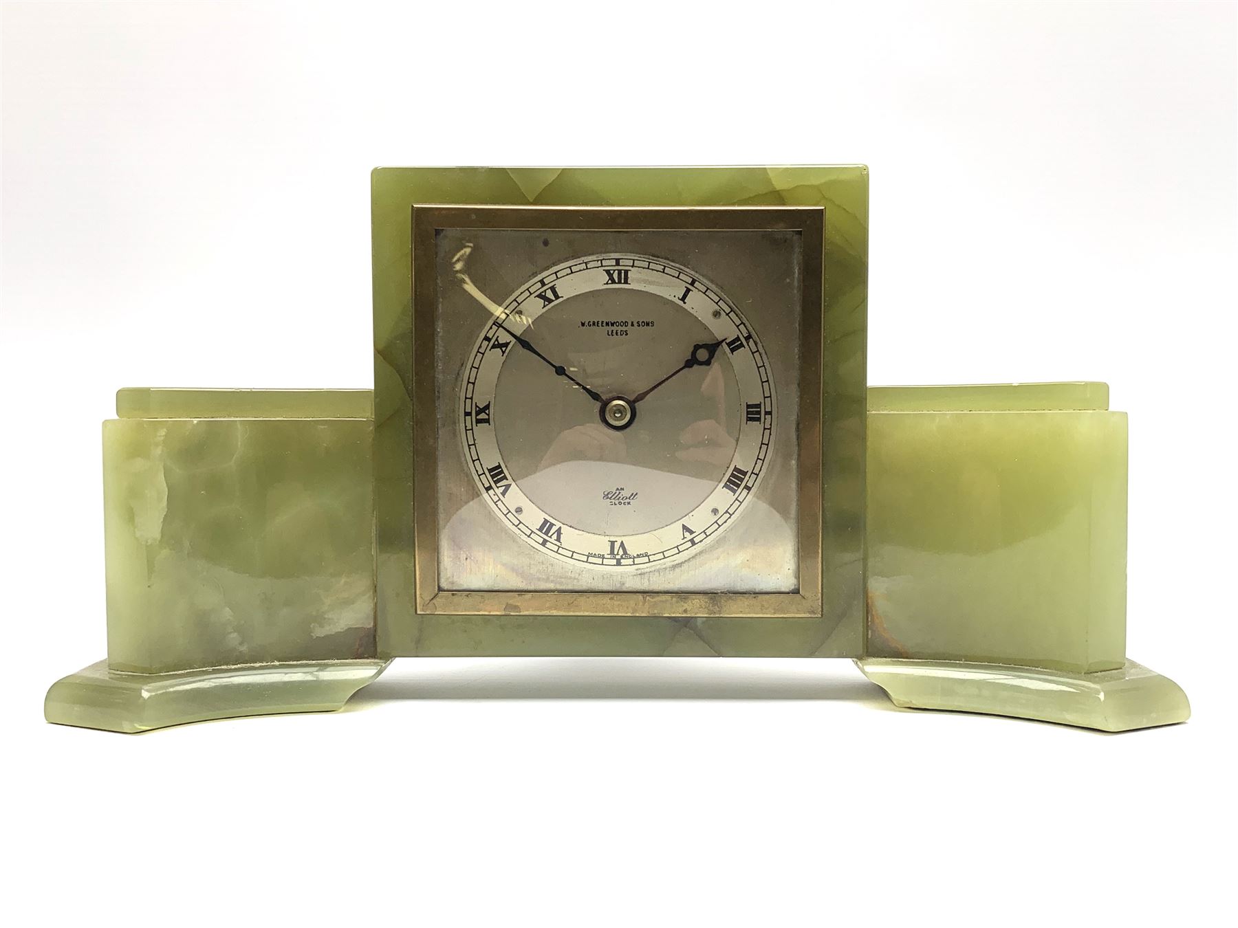 Mid to late 20th century green onyx mantel clock timepiece by 'Elliot', the square silver dial with Roman chapter ring, signed 'W. Greenwood & Sons Leeds'