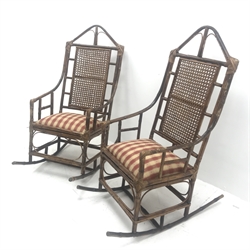 Pair bamboo framed rocking chairs, shaped cresting rail, cane work splat, upholstered seat, W55cm