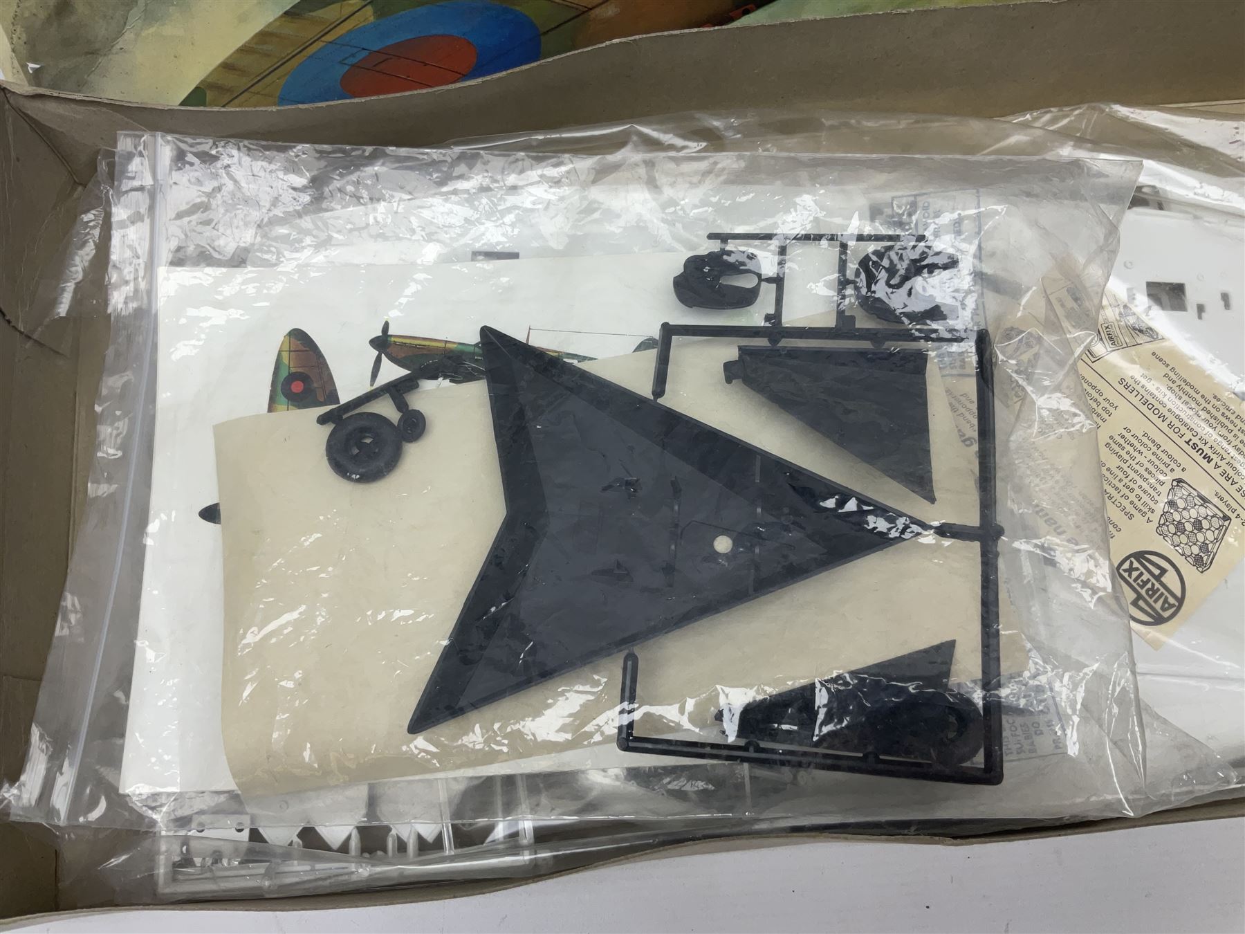 Three unmade construction kits - Airfix 1:24 scale Supermarine Spitfire Mk.1A; predominantly in unopened factory packaging with instructions and decal sheet; Frog Shell Welder with instructions; and Airfix Battle of Waterloo Farmhouse (instructions on box base); all boxed (3)