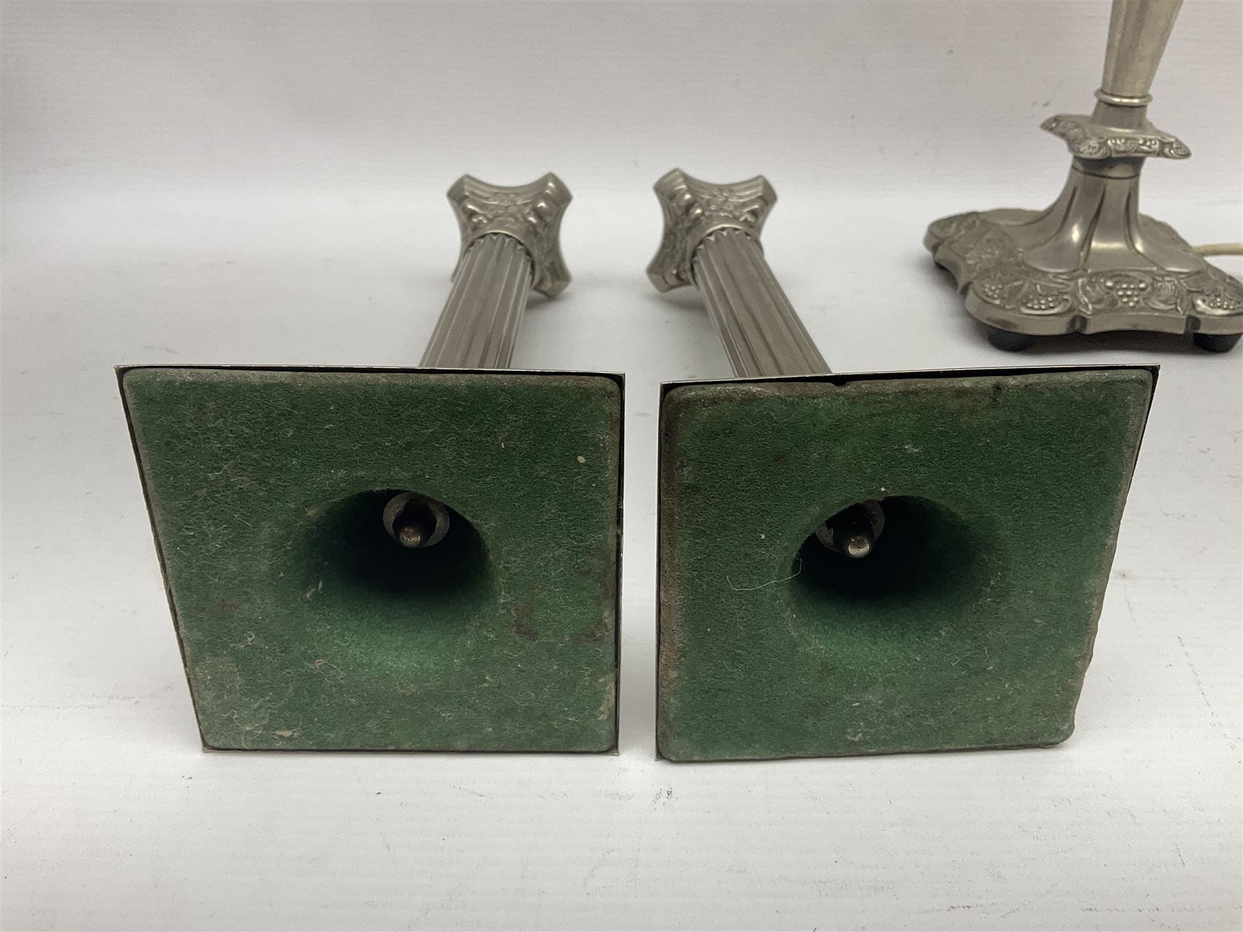 Pair of Corinthian column candlesticks, and a silver plated lamp, candlesticks H26cm