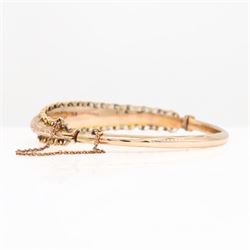 Edwardian 9ct rose gold bangle, with engraved decoration and wirework and bead work surround, Chester 1904