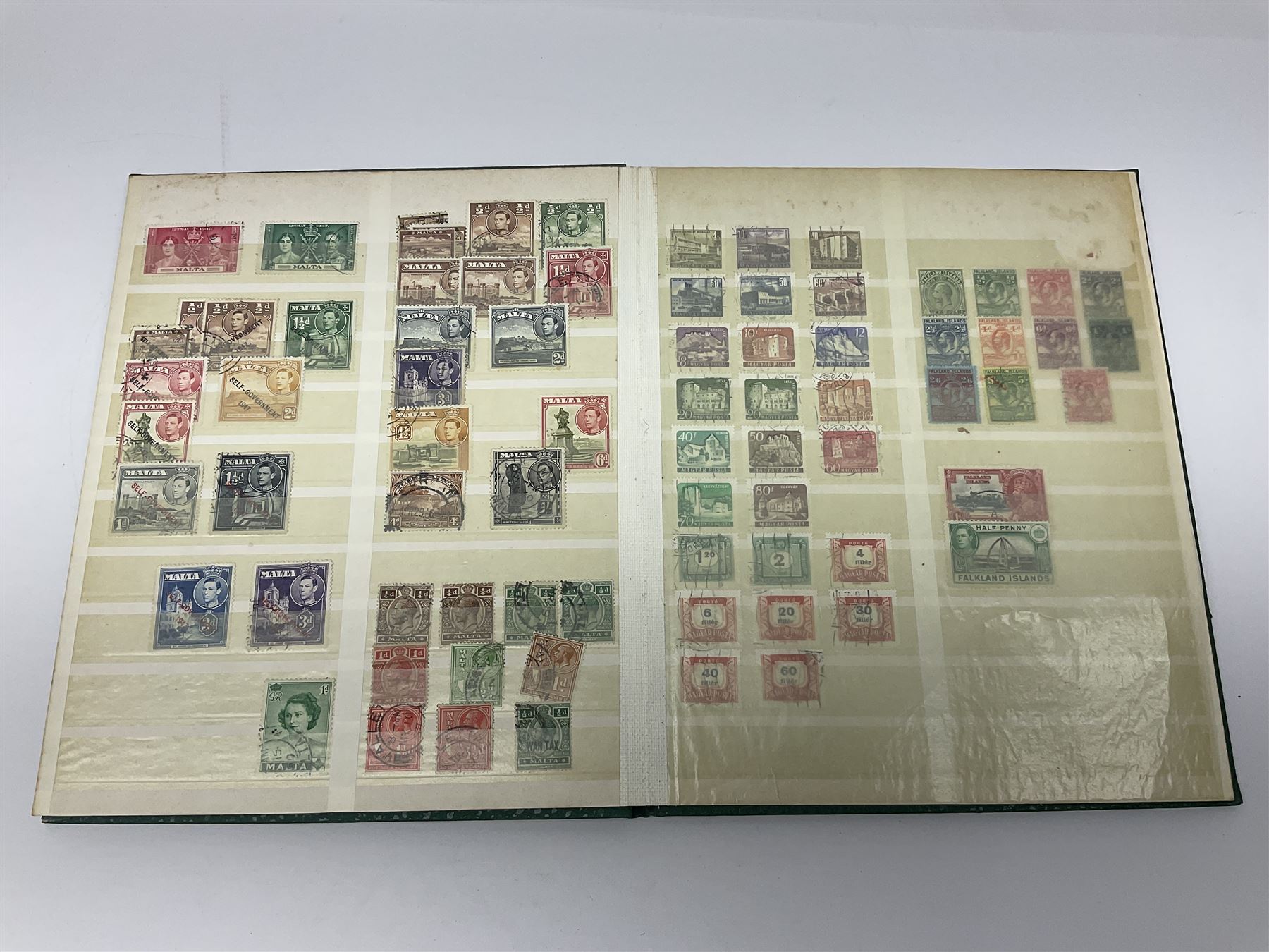 Great British, Commonwealth and World stamps, including South Africa, Malta, Falkland Islands, Gambia, Hong Kong, Grenada, Nyasaland, Somaliland, Antigua etc, housed in six albums or stockbooks