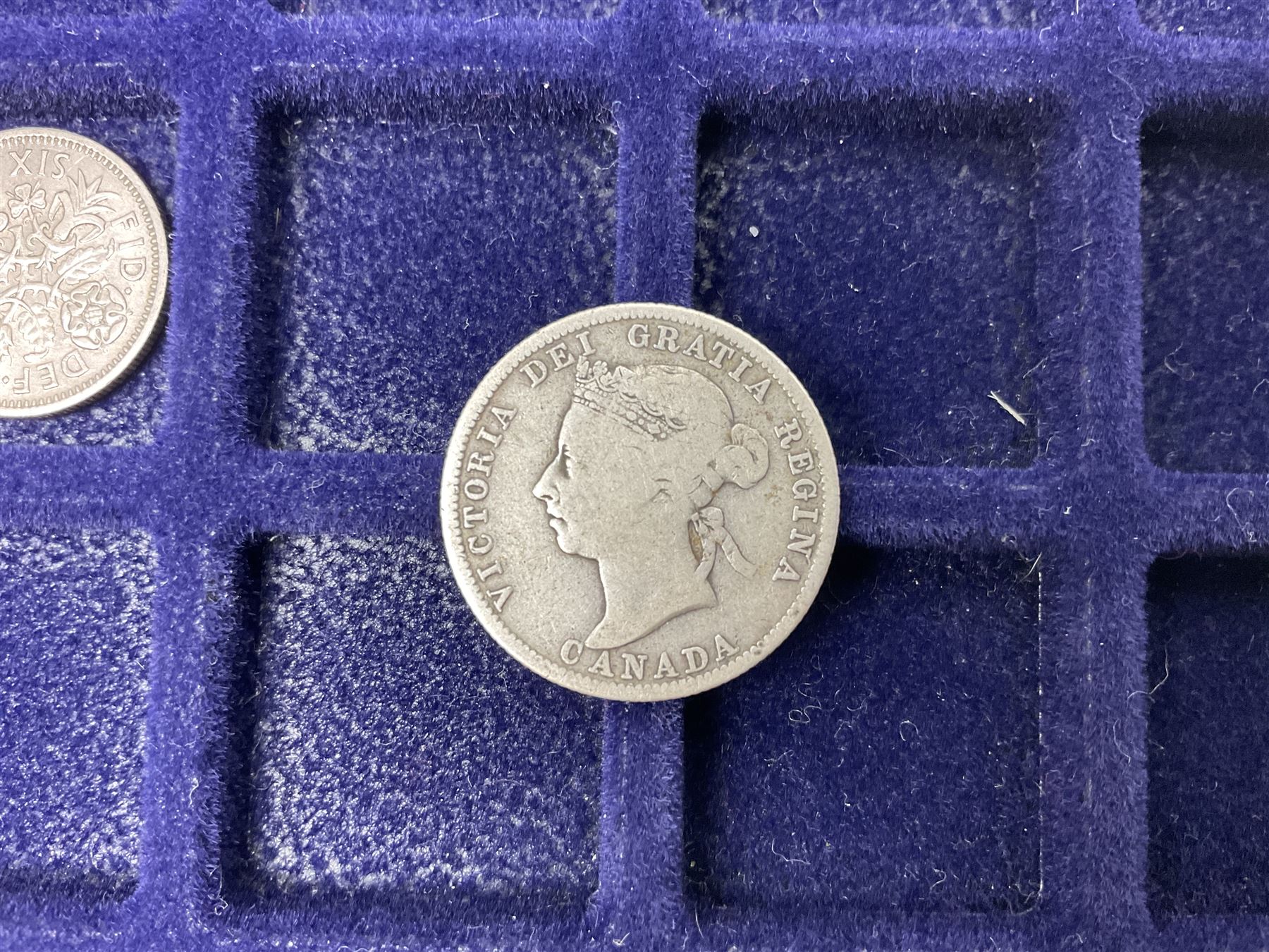 Commemorative, fantasy and other coinage, including George II 1754 farthing, George III 1773 farthing, cartwheel penny and cartwheel two pence, Queen Victoria Canada 1886 twenty five cents, various commemorative crowns etc, housed in three blue coin trays