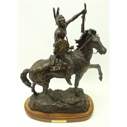  Bronze sculpture after Remington, titled 'Victory Cry' by C.R. Creek depicting a Native American on horseback preparing for battle, on oval plinth, signed, H55cm x W40cm   