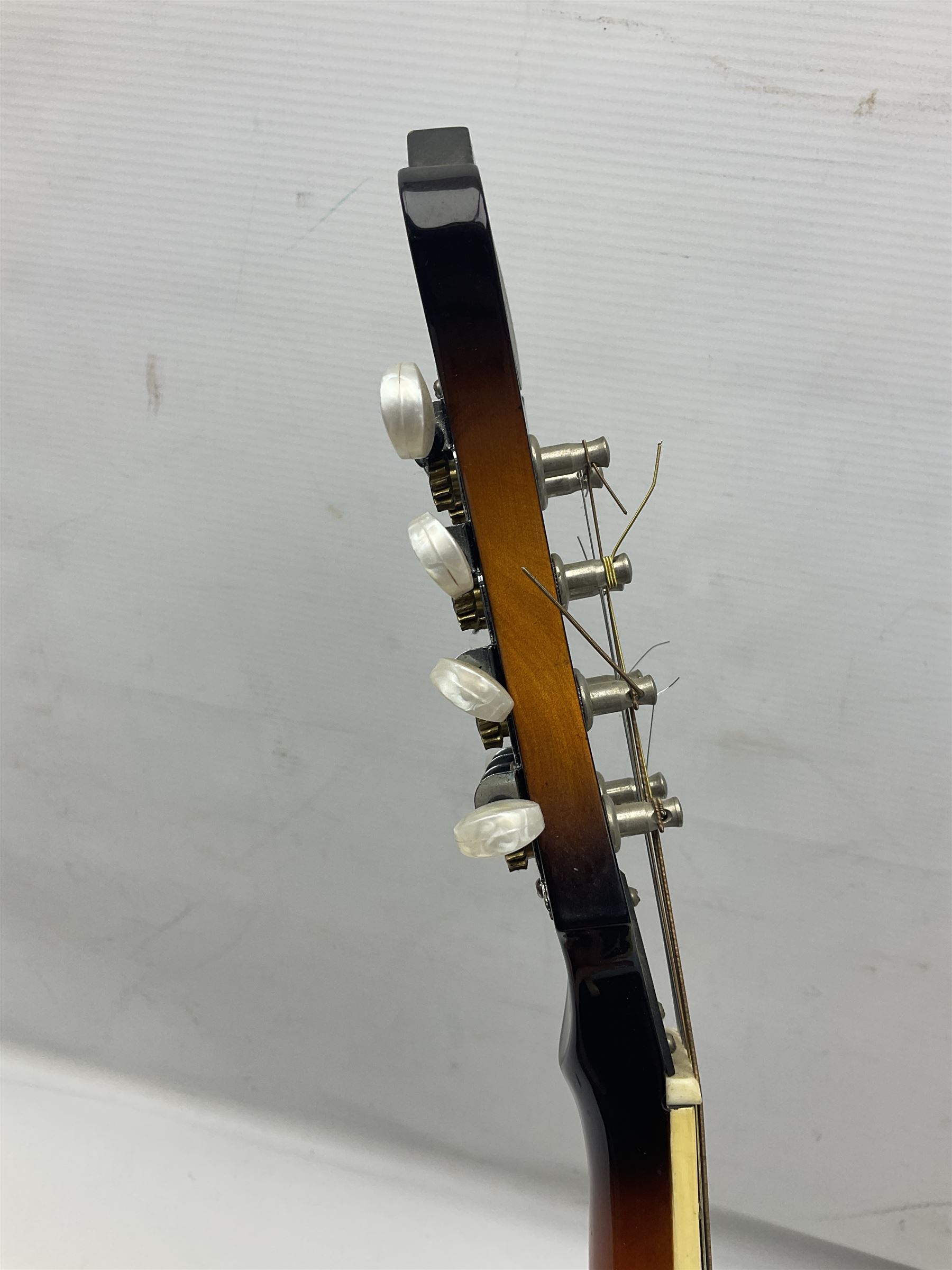 Ashbury F-Model eight-string mandolin, model no.IMF-150 with two-piece maple back and ribs and sunburst top, mother-of-pearl inlay; bears maker's label; L69cm