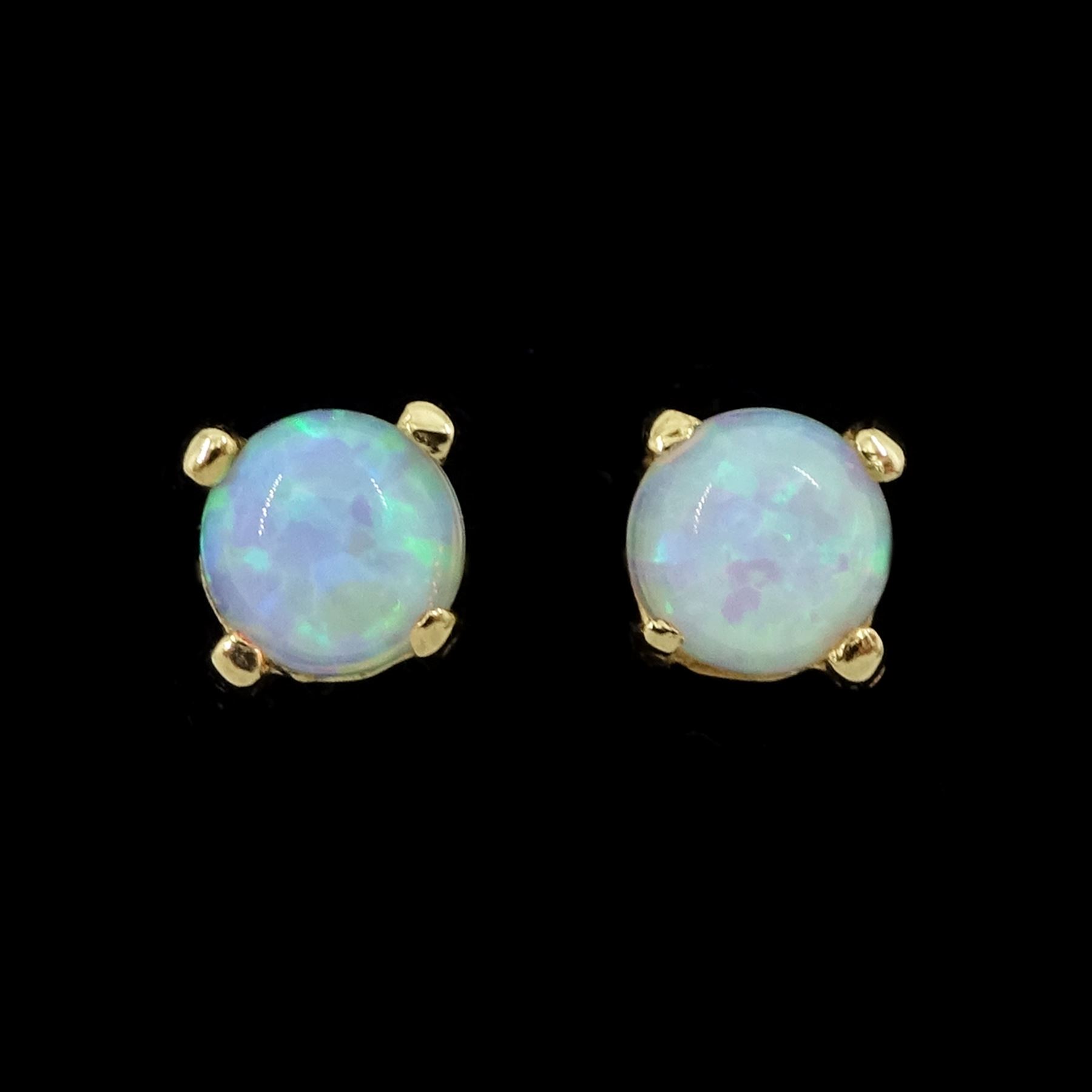 Pair of 9ct gold opal stud earrings