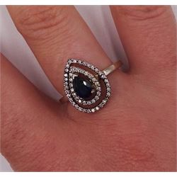14ct white gold pear shaped sapphire and round brilliant cut diamond cluster ring