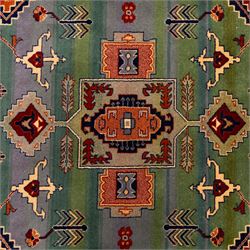 Late 20th century, French-made Caucasian design rug, woven with a dense pile, field decorated with a bold central stepped medallion flanked by stylized tribal and geometric motifs, borders of angular foliate designs in a palette of terracotta red with cotton fringe ends
