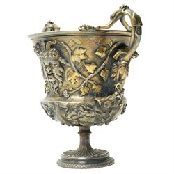 Christofle 'Tresor d'Hildesheim' facsimile gilt metal two handled cup decorated with masks, leaves etc H13cm and a bowl from the same collection with two handles and a raised pattern of leaves on a pedestal foot D19cm (2) 