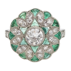  Platinum diamond ring, filigree style surround set with emerald and diamonds and diamond shoulders  
[image code: 4mc]