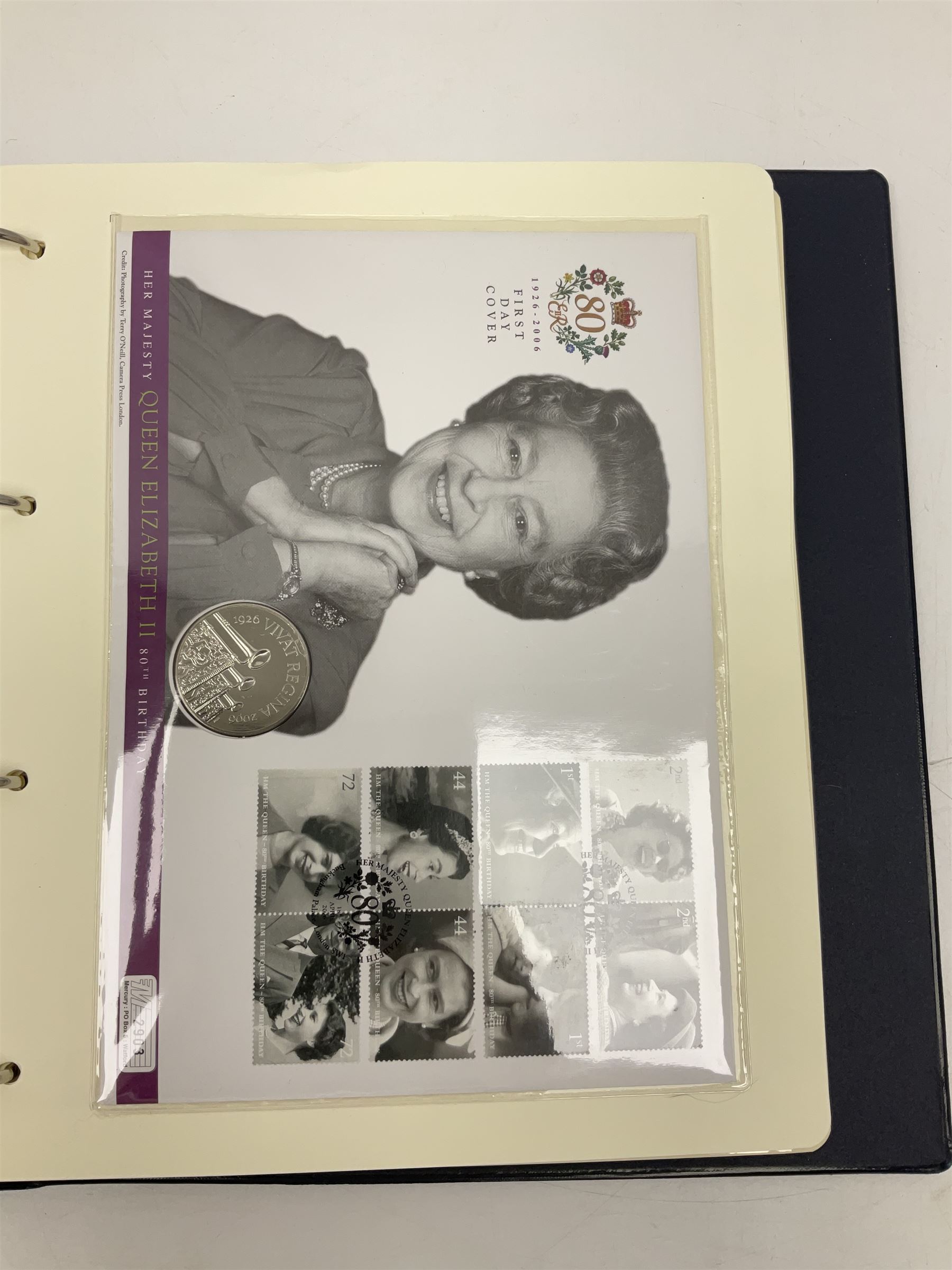Stamp and coin covers, including 2006 'Her Majesty Queen Elizabeth II 80th Birthday' containing five pounds coin, first day covers relating to Diana Princess of Wales etc, housed in a ring binder folder
