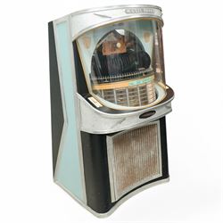 Ditchburn - 'Music Maker Panoramic 200' jukebox circa 1959, curved panoramic glazed front offering full view of the automatic selection process, accommodating 100 records (200 selections), with a stereo sound system, the aluminium trim over a woven speaker grille with an all-over ebonised and silver finish