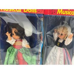 Four Mayfair Products Musical Dolls of Many Lands; original boxes and delivery boxes; and set of twelve Nationality Dolls with Sleeping Eyes; boxed (16)