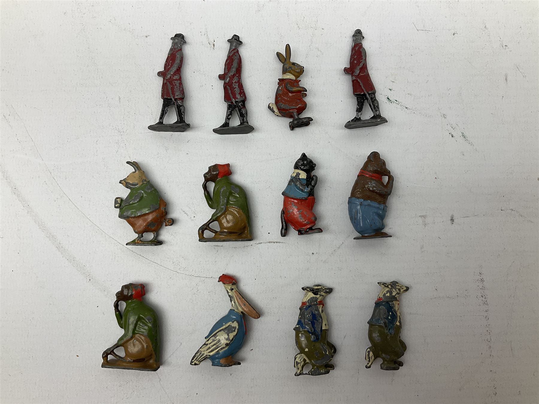 Collection of twenty-two Britains Cadbury's Cococubs play worn lead painted figures to include Mr Pie Porker, Mrs Pie Porker, Tiny Tusks, Captain Kangaroo, Granny Owl and others, Britains Snow White and Doc lead figures and other painted lead figures (30)