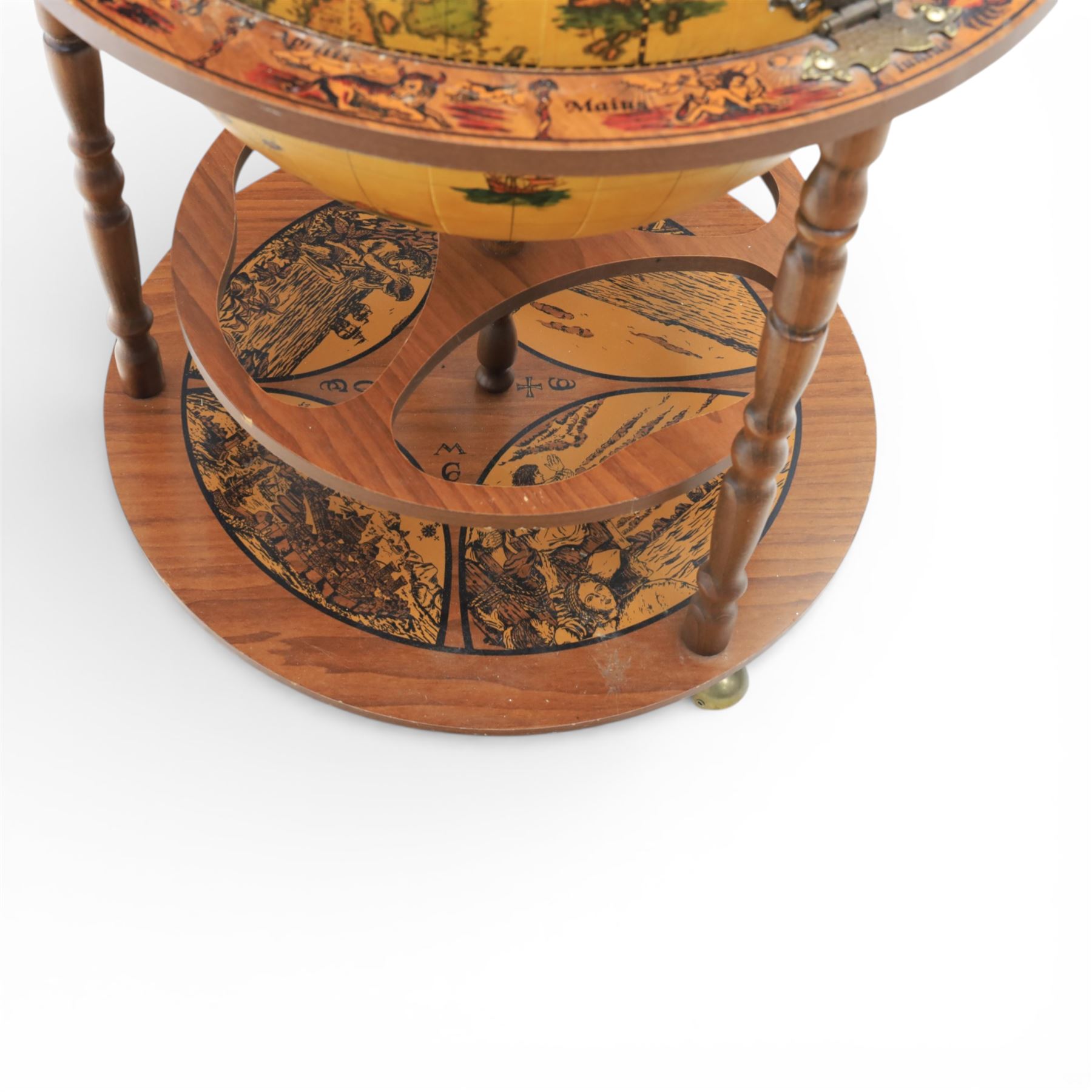 Late 20th century drinks globe, with lift off top with rotating inside with apertures for bottles, raised on brass castors