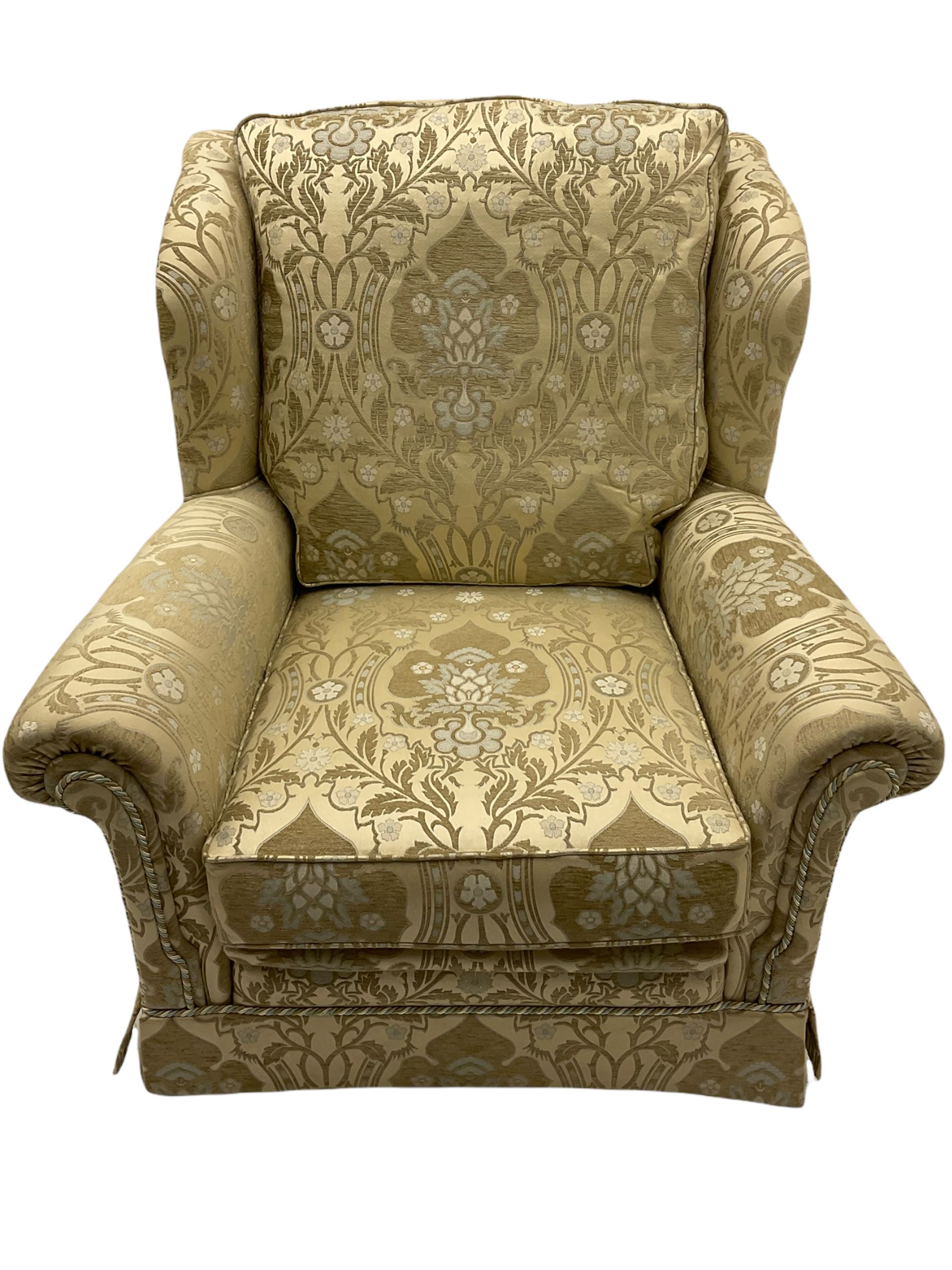 Steed Kedleston three seat sofa, and matching wing back armchair, upholstered in pale gold fabric