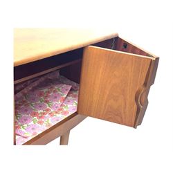 Stonehill - mid-20th century teak sideboard, three central drawers flanked by concertina cupboard doors, on tapering supports